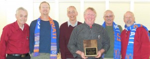 Tim Feldman receives the Schrandt award for his many contributions to boys soccer.